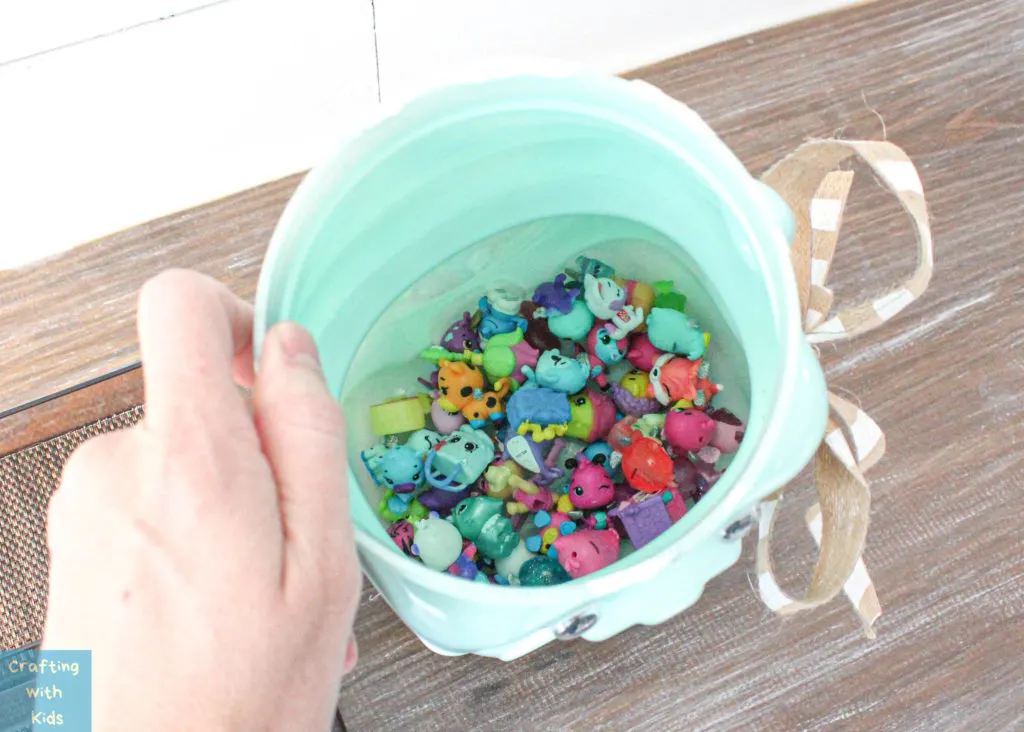 animal cracker bear jug repurposed for toy storage