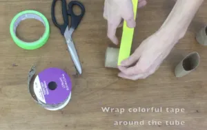 wrapping toilet paper roll in tape