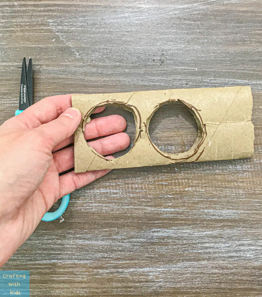 toilet paper tube with holes on both sides
