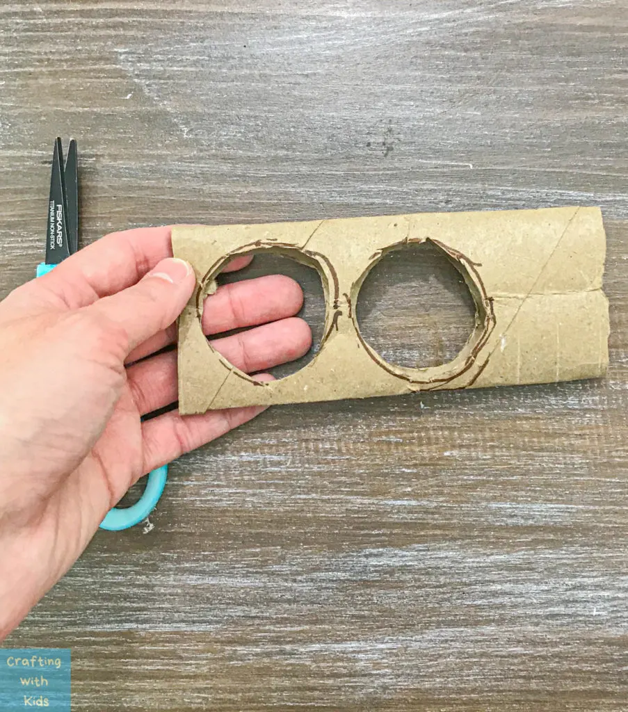 toilet paper tube with holes on both sides