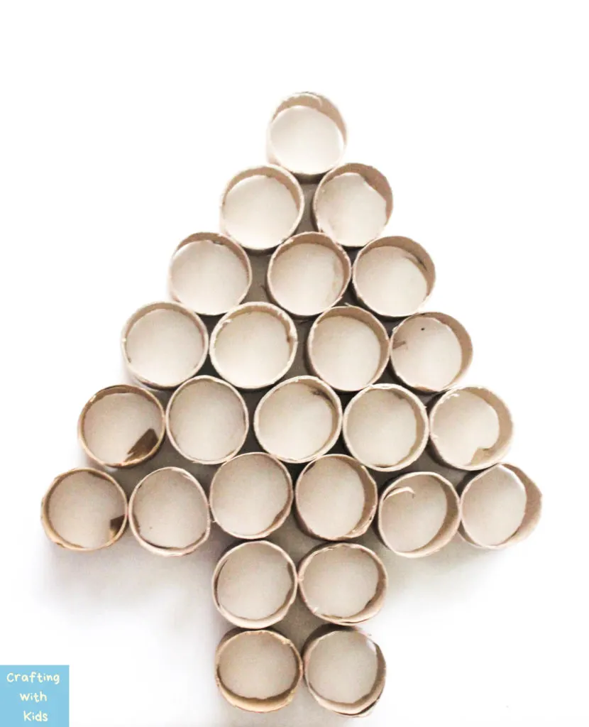 toilet paper rolls arranged in a Christmas tree