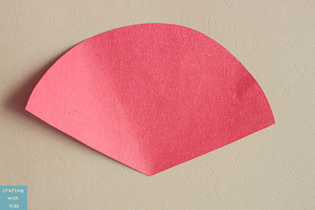 red paper in a fan shape 