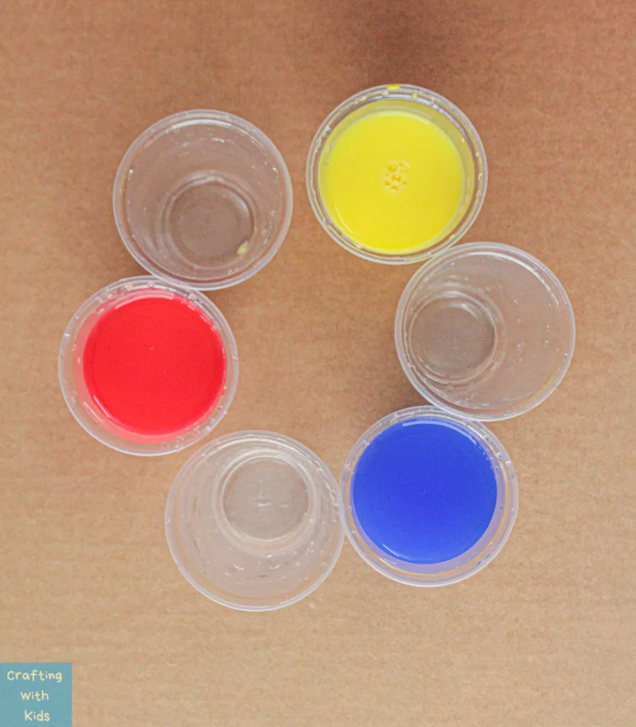 cups filled with primary colors