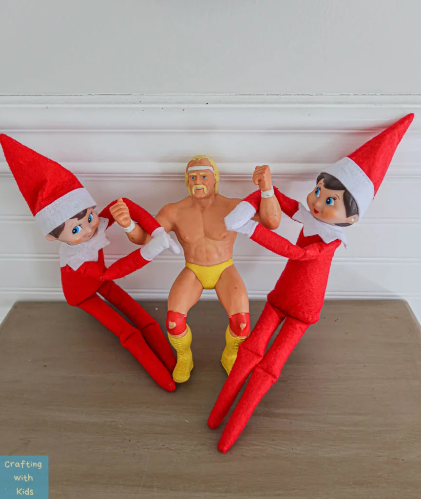 two Elf on the Shelf's fighting the Hulk