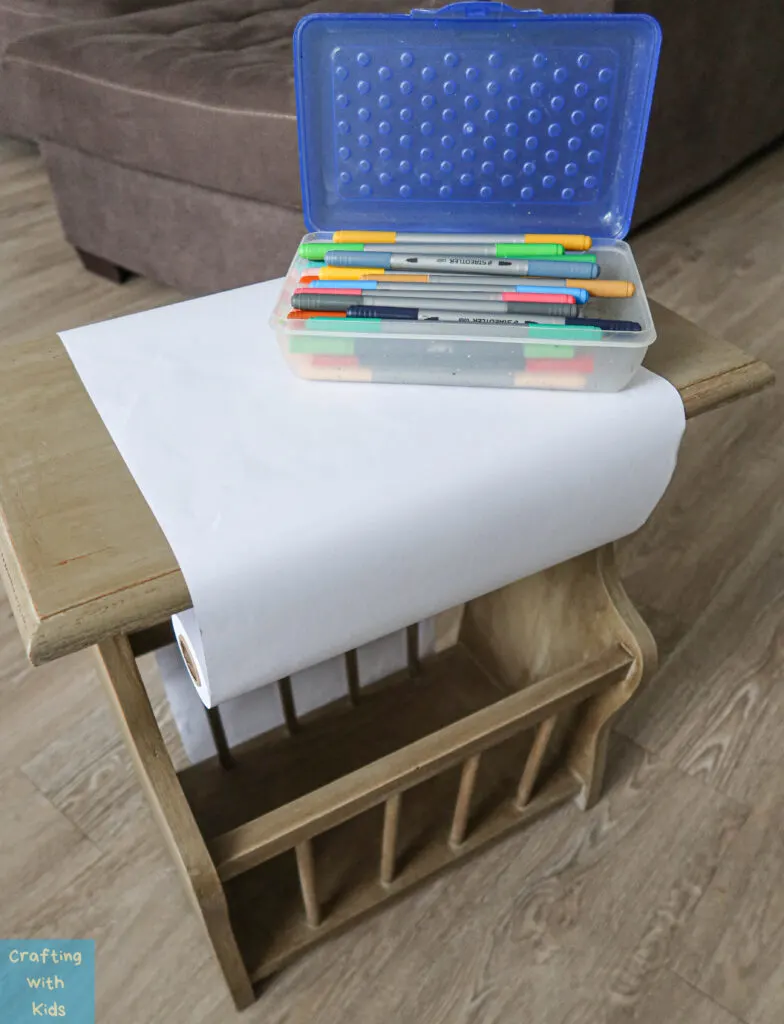 kids drawing desk with DIY paper roll holder