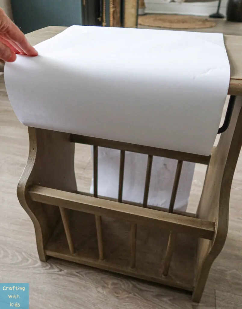 pulling paper roll over table top