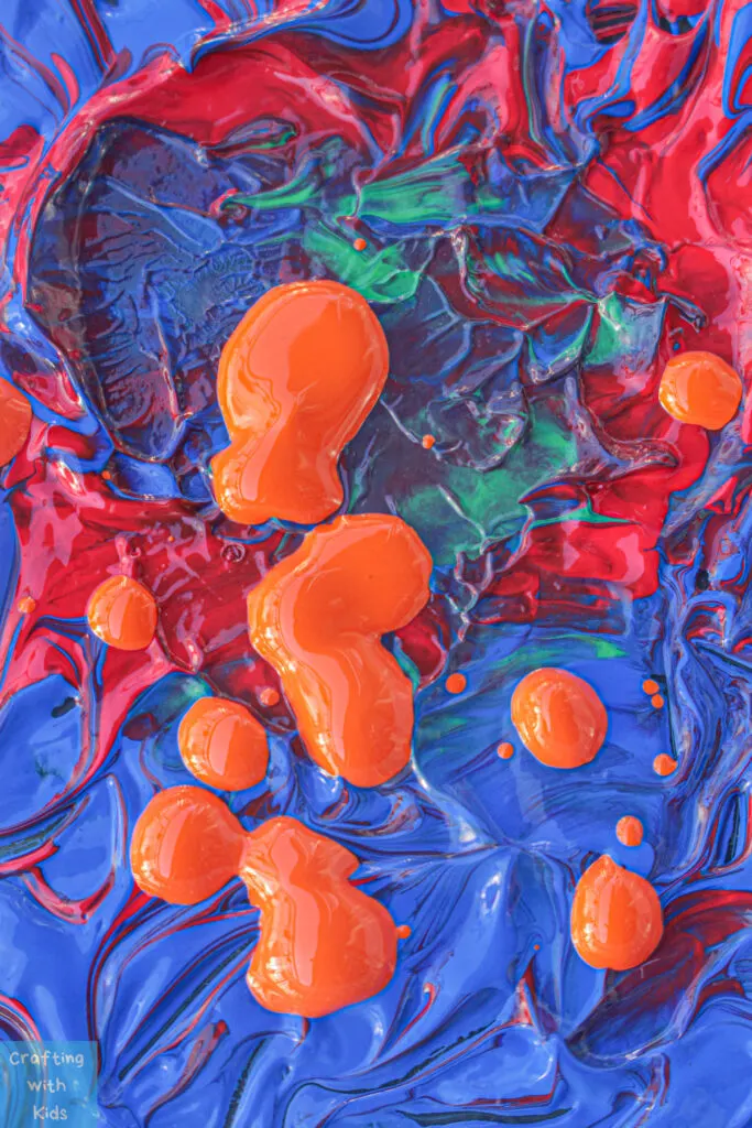 acrylic dip paint technique for painted rocks