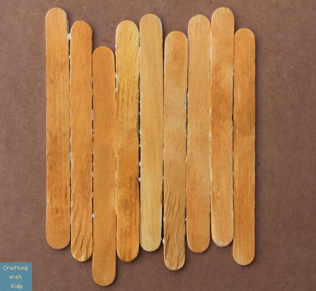 gluing popsicle sticks together