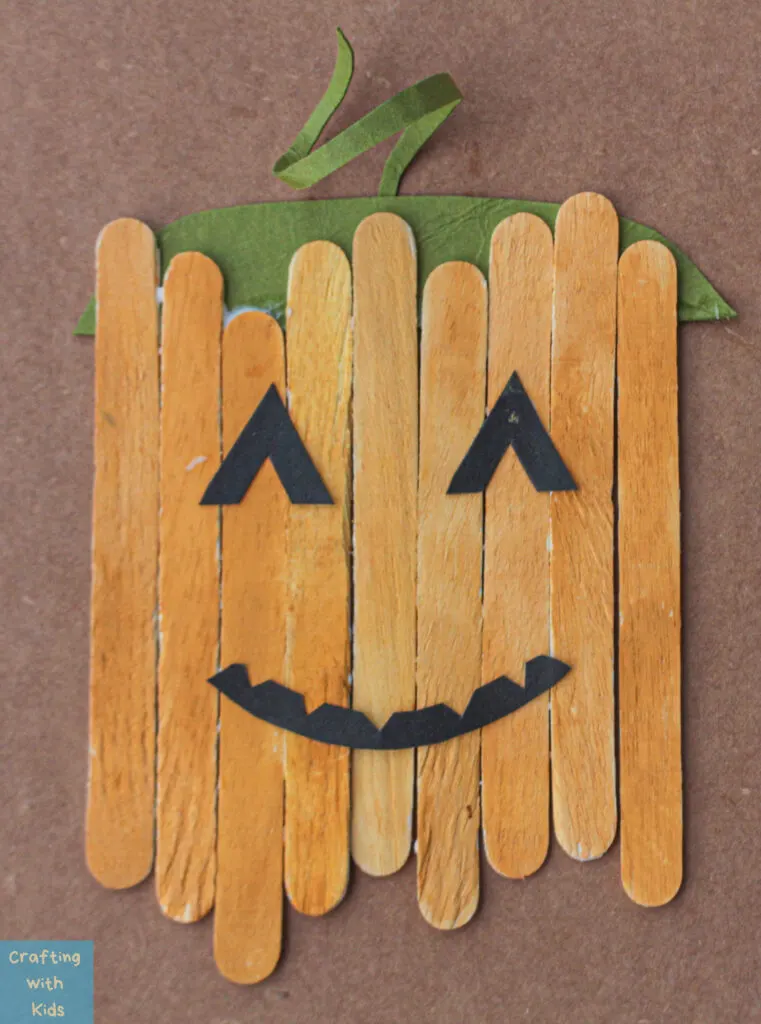 Pumpkin Popsicle Stick Craft - Frosting and Glue- Easy crafts, games,  recipes, and fun