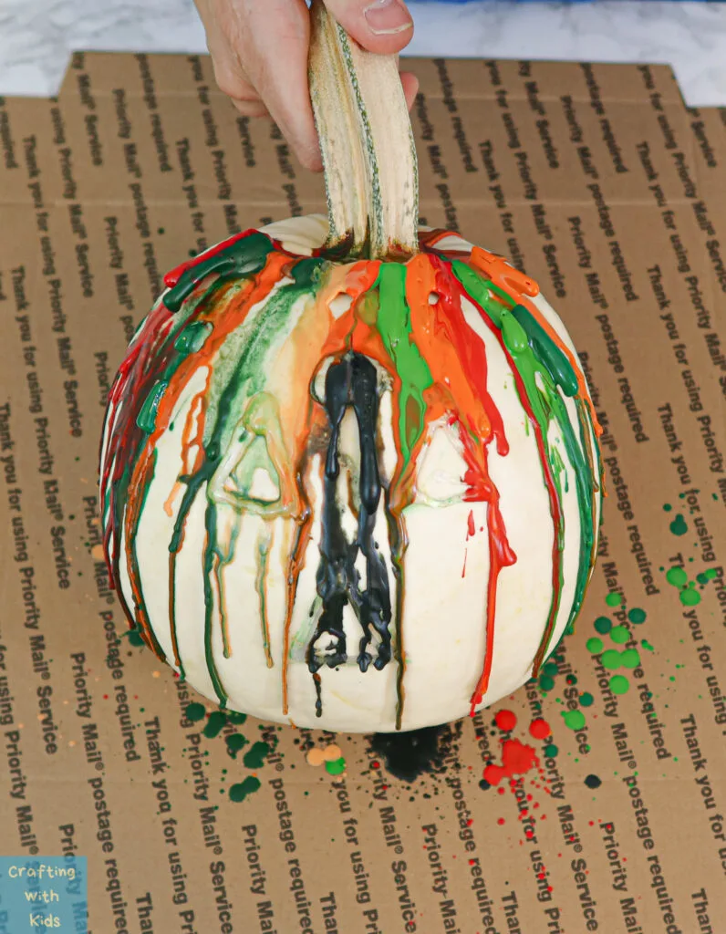 melted crayon art on pumpkin