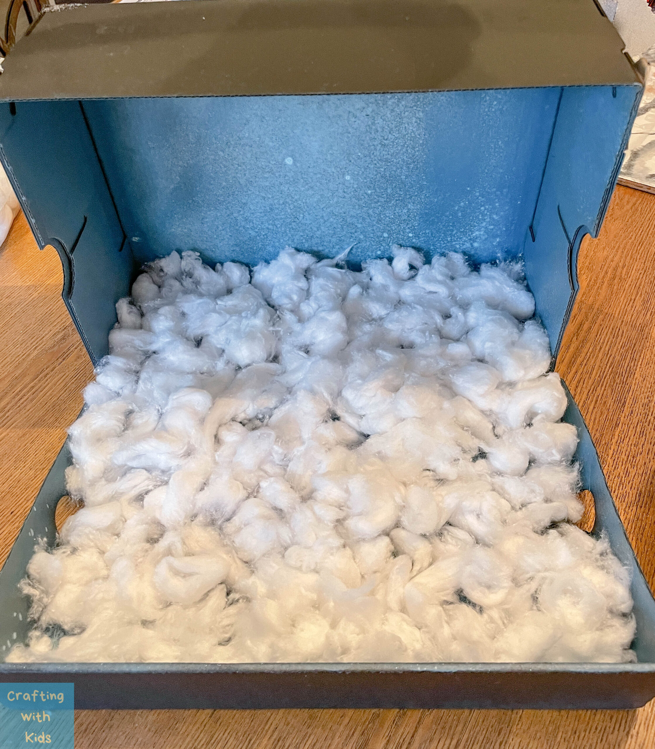 base of diorama with cottonballs