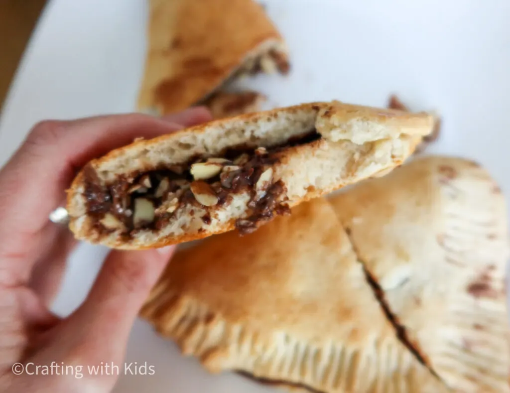 Nutella calzone with almond slices
