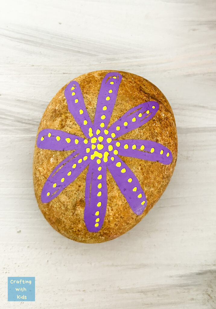 flower painted rock